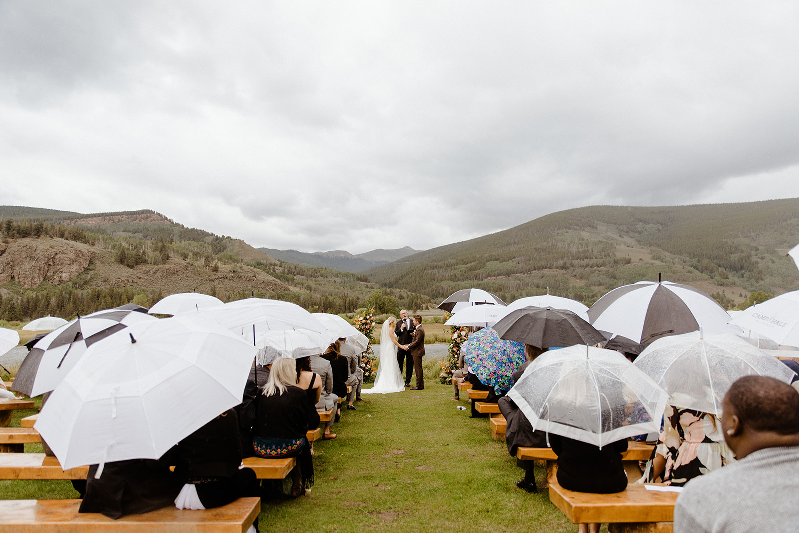 Camp Hale Rainy Wedding with Umbrellas August